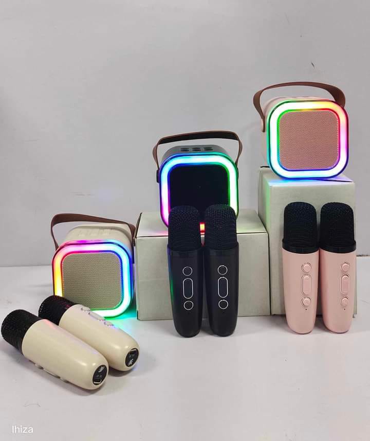 MINI K12 speaker comes with two karaoke microphones