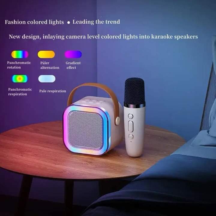 MINI K12 speaker comes with two karaoke microphones